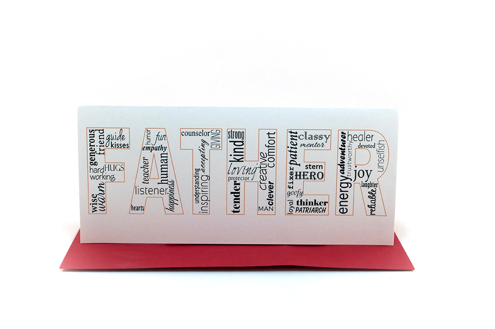 Greeting card standing upright on top of a colorful envelope against a white background.