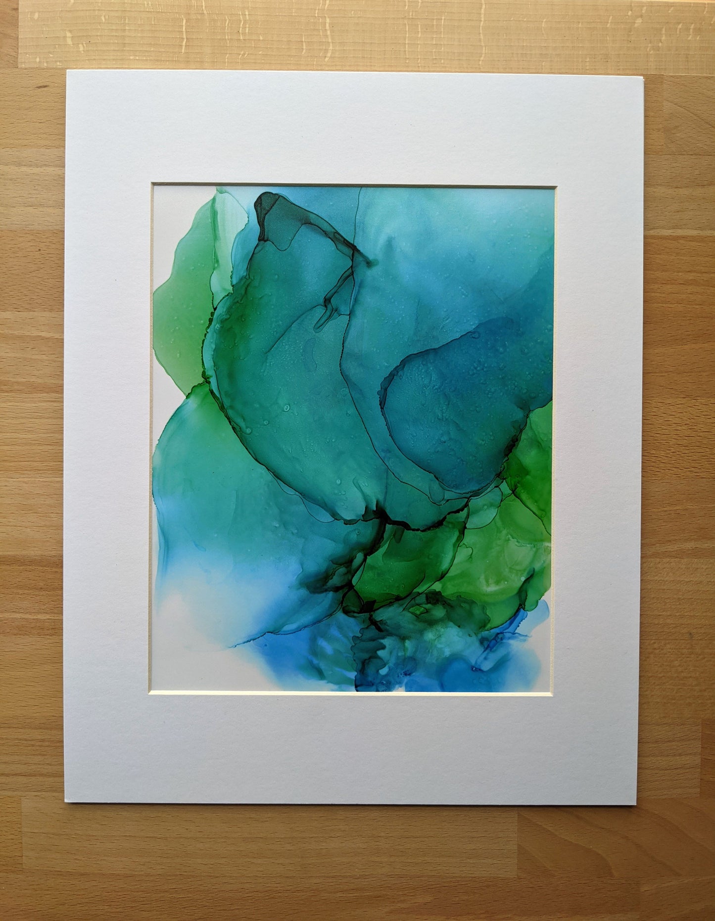 Painting shown with a white mat.