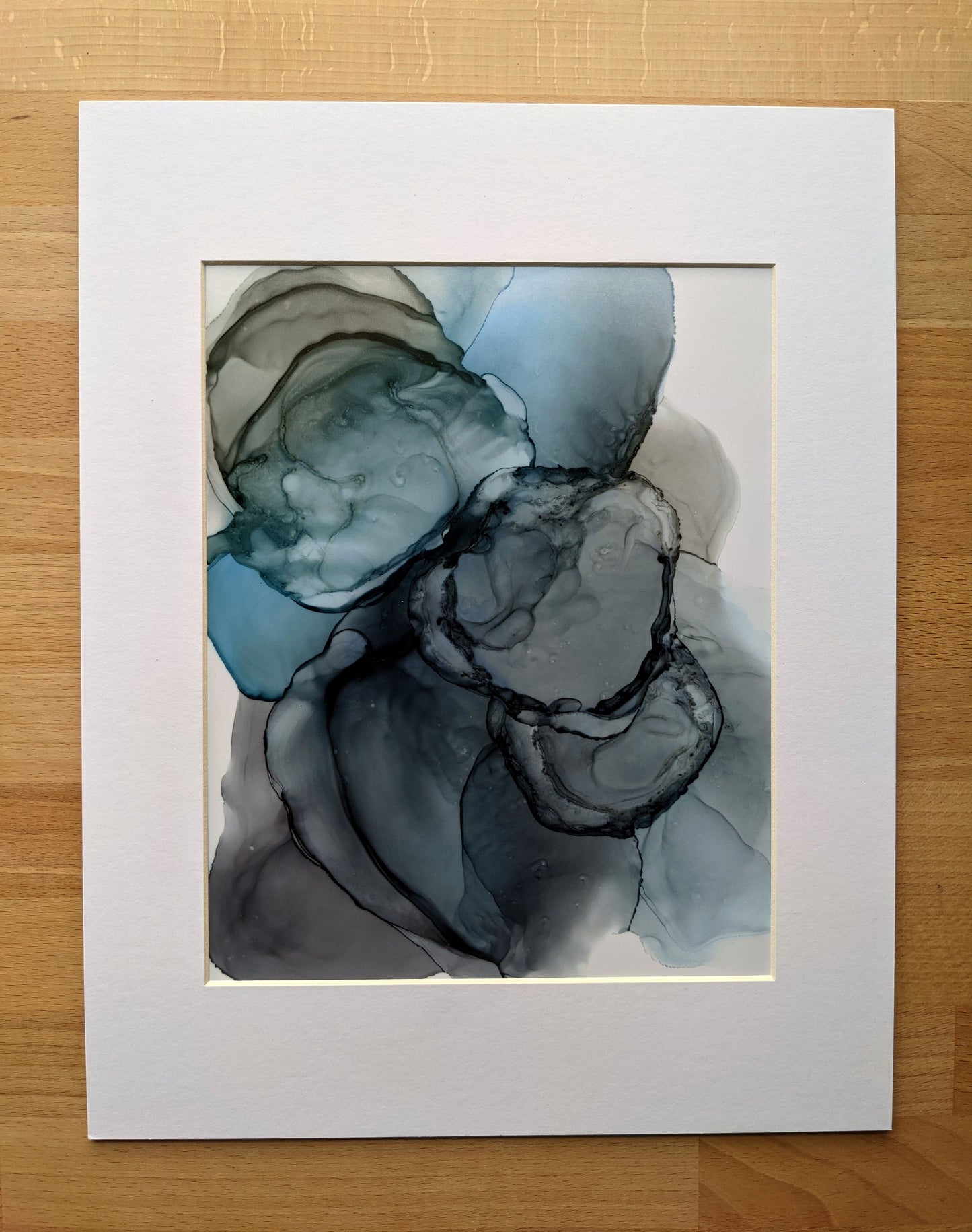 Painting shown with a white mat.