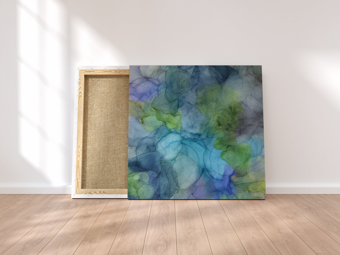 Digital mockup of Splash leaning on a wood floor against a white wall with shadows cast and light from a window.
