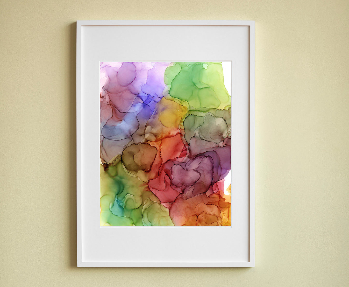 Digital mockup of Surrounded By Abundance framed in white hung on a pale yellow wall.